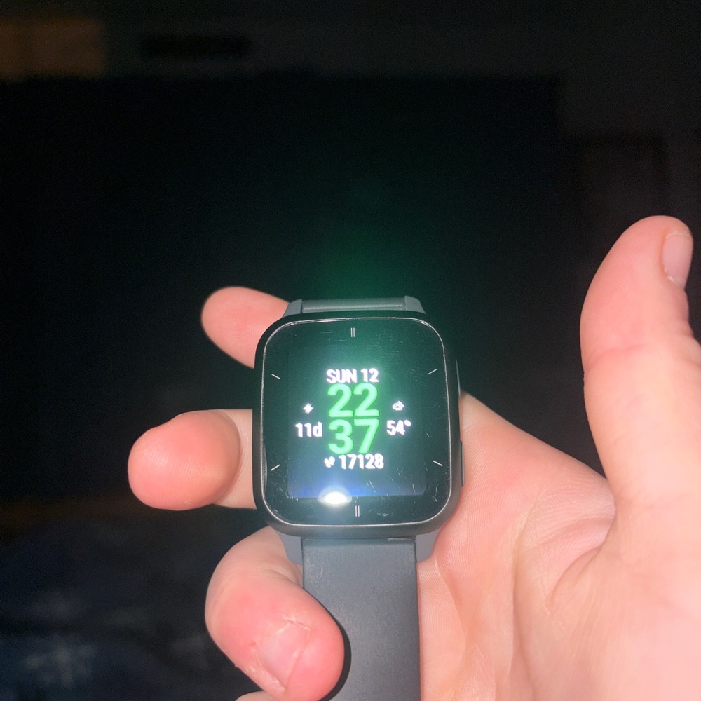 Black Smartwatch with Green Display